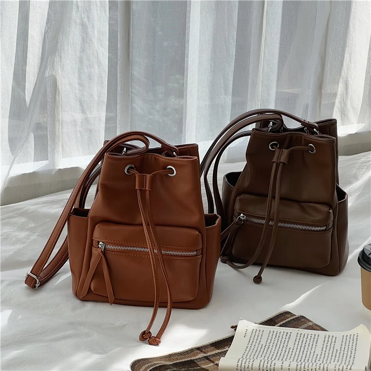 Wholesale new solid color female crossbody bag fashion trend ladies pleated shoulder bag soft PU leather female bucket bag
Wholesale new solid color female crossbody bag fashion trend ladies pleated shoulder bag soft PU leather female bucket bag