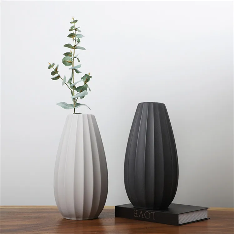 Vertical embossed design matt hotel decorative modern ceramic vase / color clay vases for home decor, Customized
Vertical embossed design matt hotel decorative modern ceramic vase / color clay vases for home decor, Customized