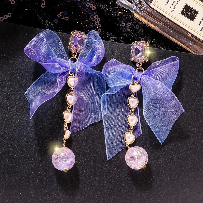 Kaimei 2021 New Korean Elegant Sweet Cloth Bow Transparent Ball Long Pendant Earrings Female Girls purple bow tie lace earrings, Many colors fyi
Kaimei 2021 New Korean Elegant Sweet Cloth Bow Transparent Ball Long Pendant Earrings Female Girls purple bow tie lace earrings, Many colors fyi