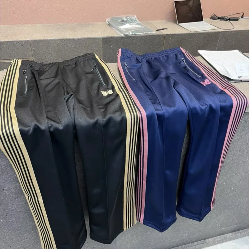 AWGE Needles Sweatpants Yellow Embroidered Butterfly Ribbon Drawstring Pants Causal Loose Needles Trousers for Men Women
AWGE Needles Sweatpants Yellow Embroidered Butterfly Ribbon Drawstring Pants Causal Loose Needles Trousers for Men Women