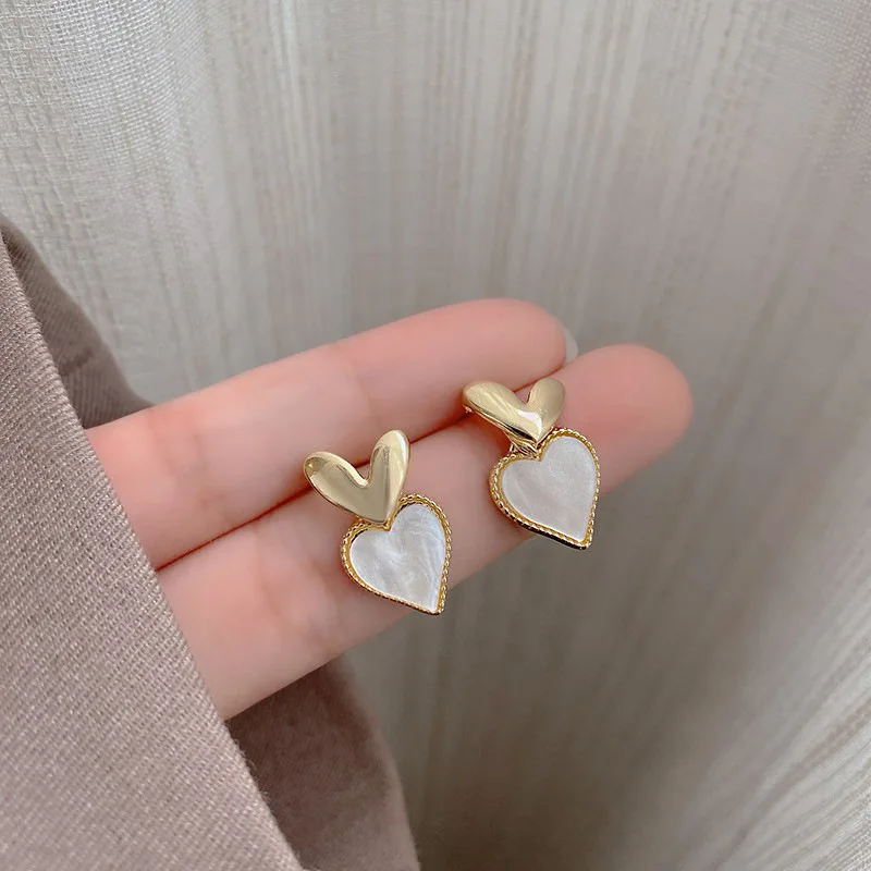 

pure white heart jewelry spiral earrings crystal embellished earrings custom stud earrings