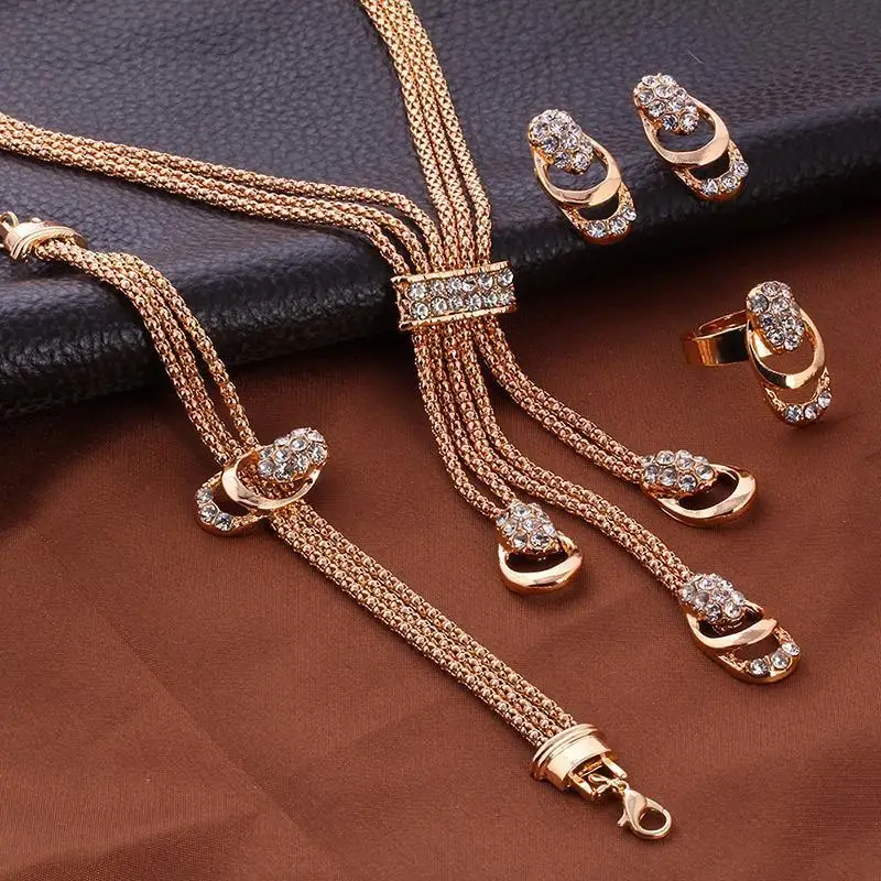 Rose Gold Color Crystal Necklace Earring Bracelet Ring Set Rhinestone New Simple Party Dress Jewelry Sets For Women
Rose Gold Color Crystal Necklace Earring Bracelet Ring Set Rhinestone New Simple Party Dress Jewelry Sets For Women