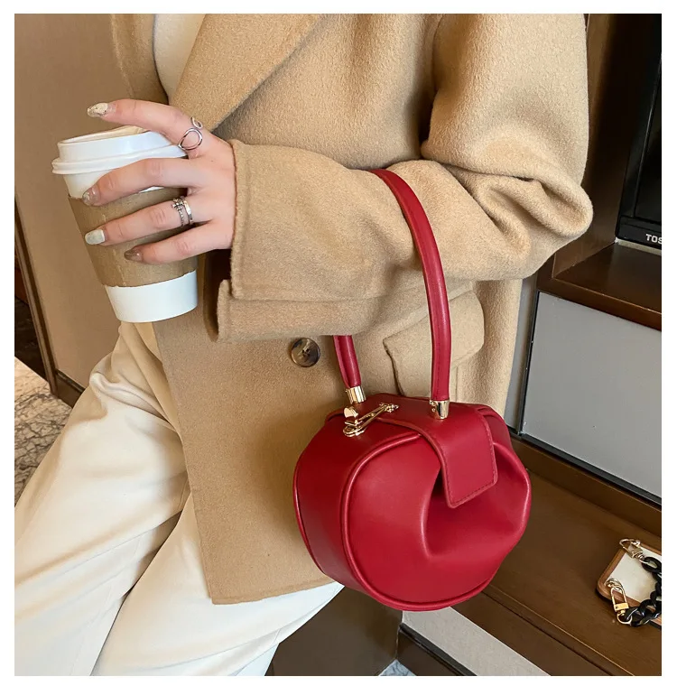 latest trendy mini solid color round girl purse pu leather clutch shoulder bags for ladies 2021
latest trendy mini solid color round girl purse pu leather clutch shoulder bags for ladies 2021