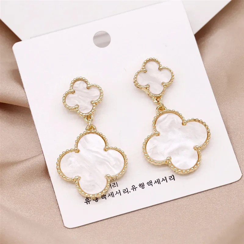 New 925 Sterling Silver double flower four leaf grass earrings with tassel and white Fritillaria earrings for girls
New 925 Sterling Silver double flower four leaf grass earrings with tassel and white Fritillaria earrings for girls