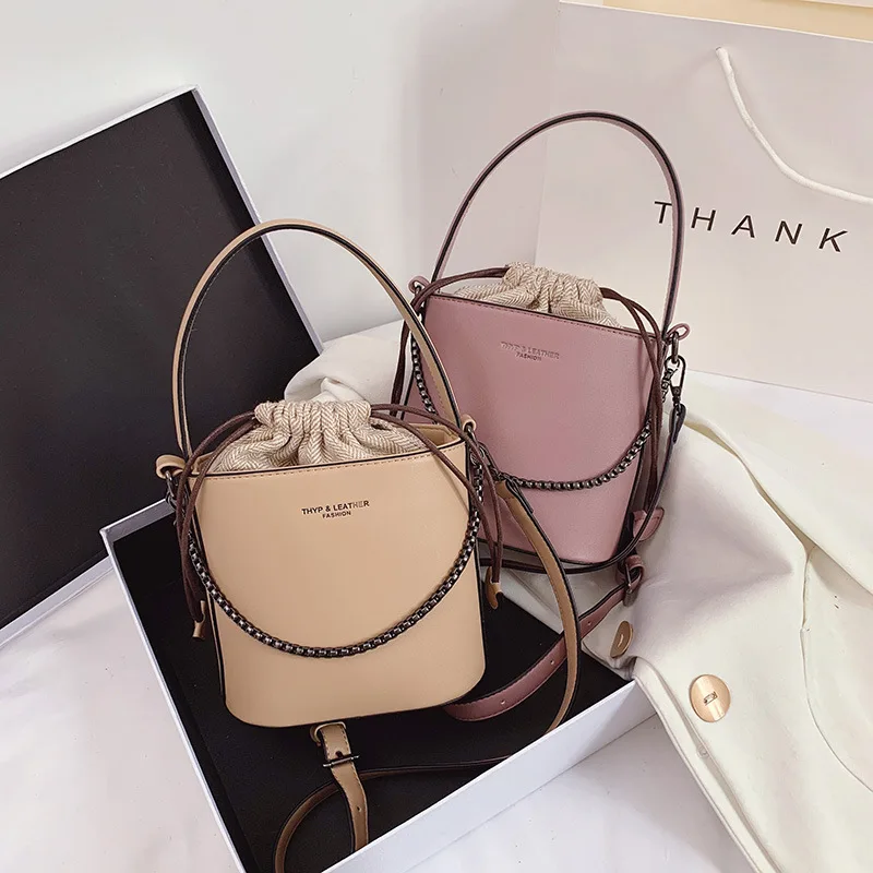 2021 Fashion letter chain drawstring bundle mouth bucket shoulder bag wholesale girls shopping purse and phone handbags, 5 colors
2021 Fashion letter chain drawstring bundle mouth bucket shoulder bag wholesale girls shopping purse and phone handbags, 5 colors