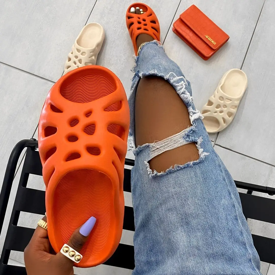 Soft Foam slides wholesale hollow out eva orange unisex yeezy foam beach slipper slides for women men, Picture color
Soft Foam slides wholesale hollow out eva orange unisex yeezy foam beach slipper slides for women men, Picture color