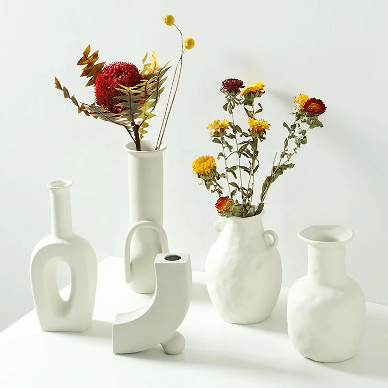 Modern White Ceramic Irregular Flower Vase Handmade Art Porcelain White Ceramic Vase Decoration For Home
Modern White Ceramic Irregular Flower Vase Handmade Art Porcelain White Ceramic Vase Decoration For Home