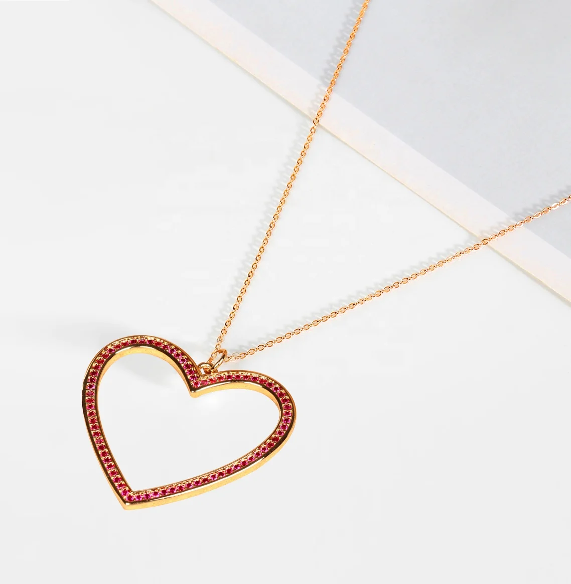 European new fashion brass 18K gold plated hollow big love heart inlay colorful zircon pendant necklace for women jewelry
European new fashion brass 18K gold plated hollow big love heart inlay colorful zircon pendant necklace for women jewelry