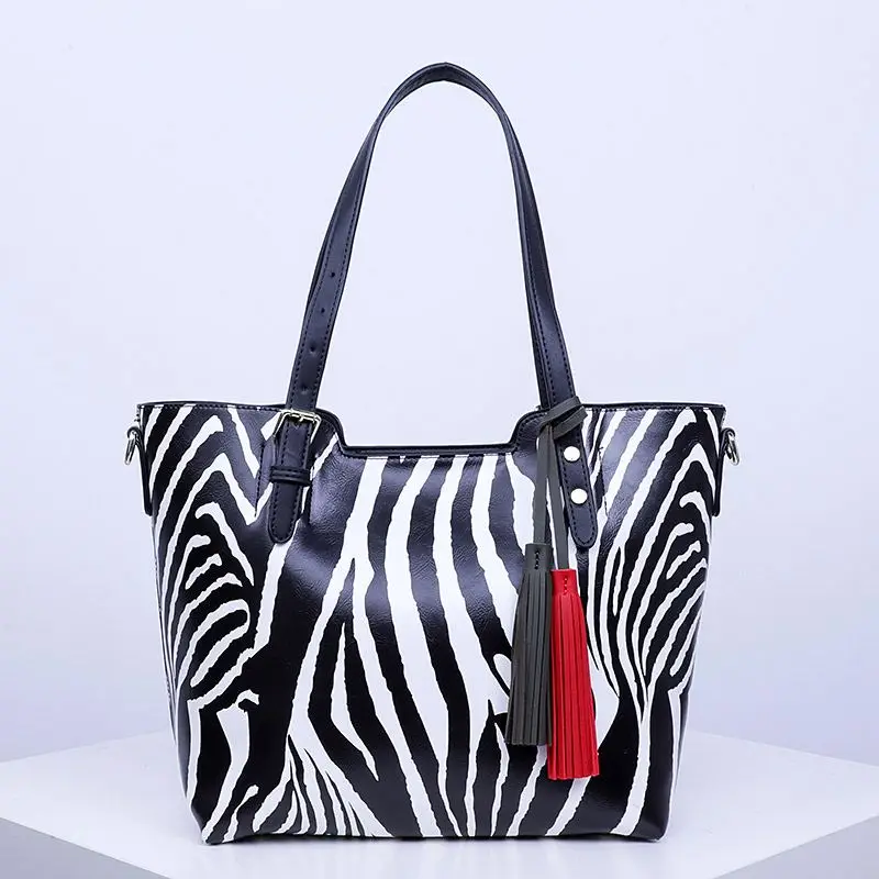 SH754 Wholesale custom handbag Printed Fashion Leopard Zebra Print Glossy PU Leather Ladies Large Handbag Bag With Tassel
SH754 Wholesale custom handbag Printed Fashion Leopard Zebra Print Glossy PU Leather Ladies Large Handbag Bag With Tassel