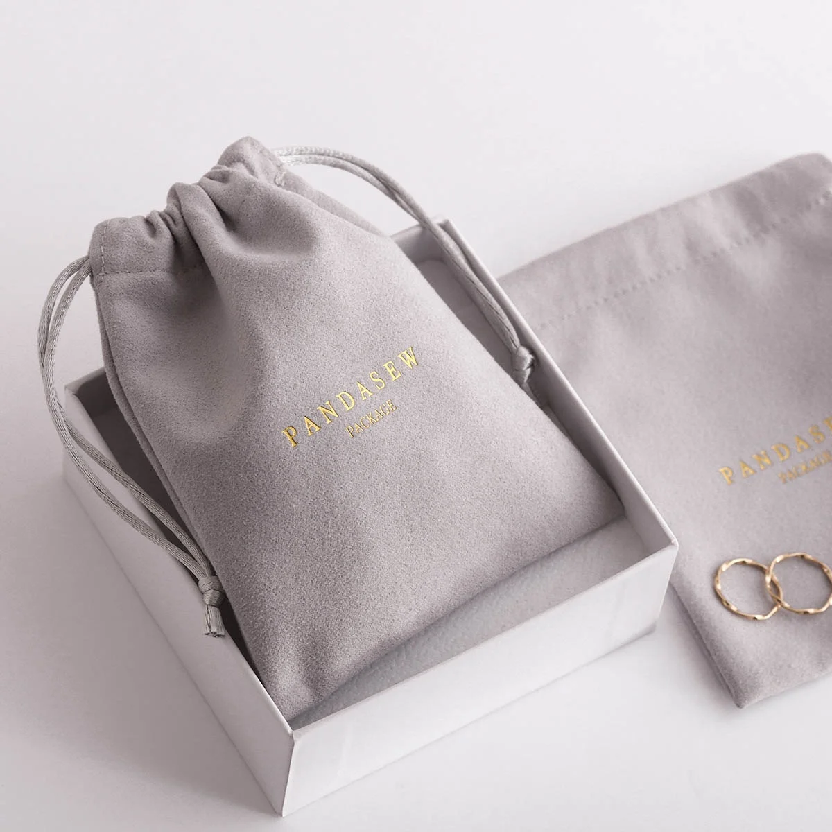 PandaSew Gray 10*8cm Custom Logo Printed Velvet Jewelry Pouch Gifts Drawstring Bag, Customized color
PandaSew Gray 10*8cm Custom Logo Printed Velvet Jewelry Pouch Gifts Drawstring Bag, Customized color