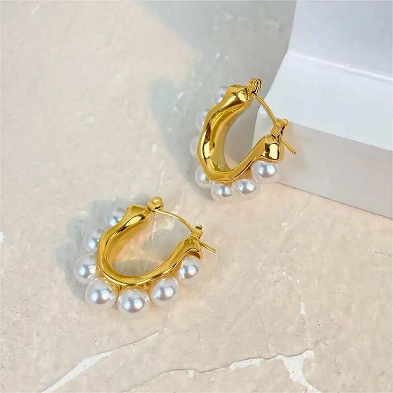 Titanium steel earrings 18K gold-plated stainless steel inlaid with white pearl C-shaped earrings do not fade jewelry
Titanium steel earrings 18K gold-plated stainless steel inlaid with white pearl C-shaped earrings do not fade jewelry