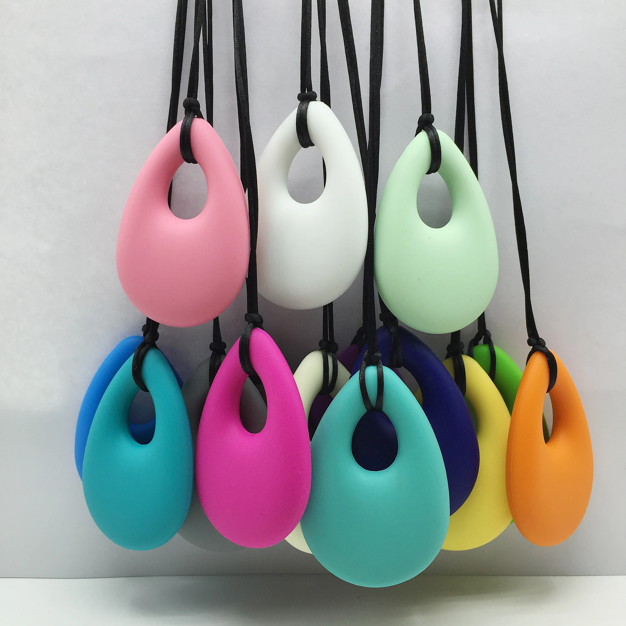 Wholesales Autism Sensory Chewing Pop It Rainbow Teardrop Molds Baby Kids Teether Silicone Pendant, 17 colors
Wholesales Autism Sensory Chewing Pop It Rainbow Teardrop Molds Baby Kids Teether Silicone Pendant, 17 colors