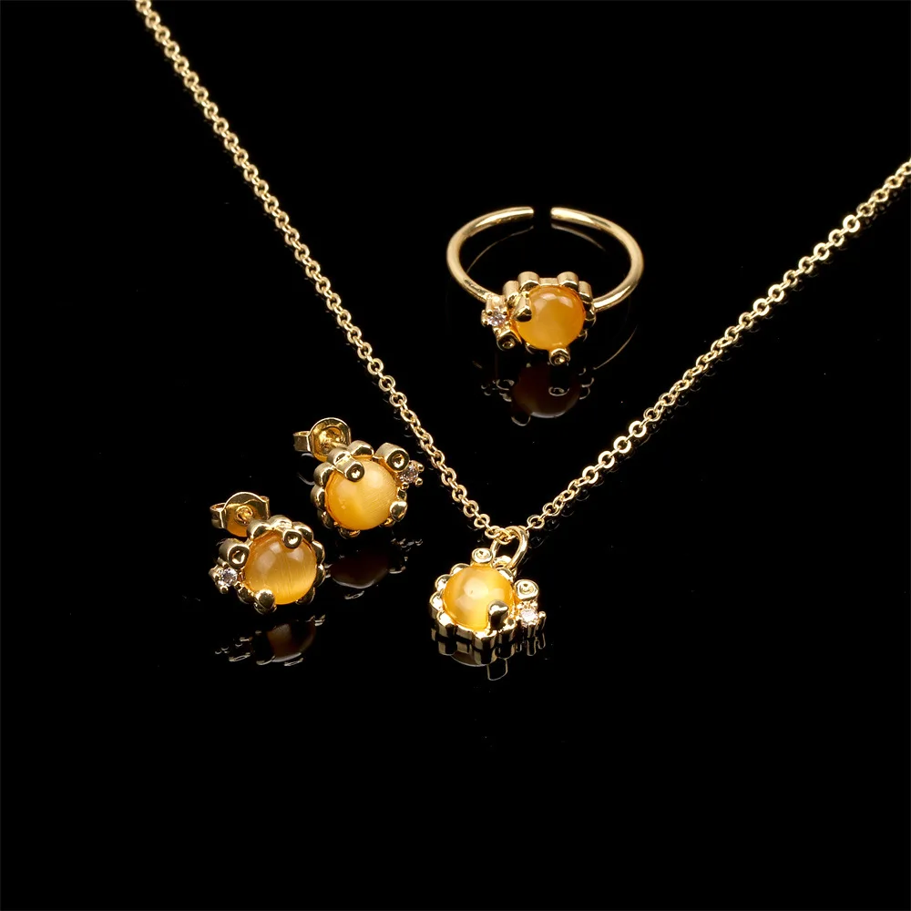 Stylish Gold Plated O Shape Chain Yellow Opal Pendant Necklace Jewelry Set Yellow Cat Eye Stone Stud Earring Ring Set For Girls
Stylish Gold Plated O Shape Chain Yellow Opal Pendant Necklace Jewelry Set Yellow Cat Eye Stone Stud Earring Ring Set For Girls