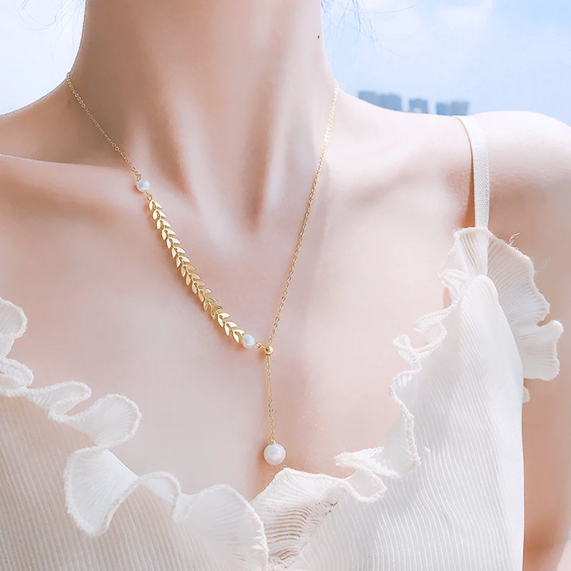XL86131 Fashion design gold plated brass women jewelry pearl wheat leaf pendant necklace
XL86131 Fashion design gold plated brass women jewelry pearl wheat leaf pendant necklace