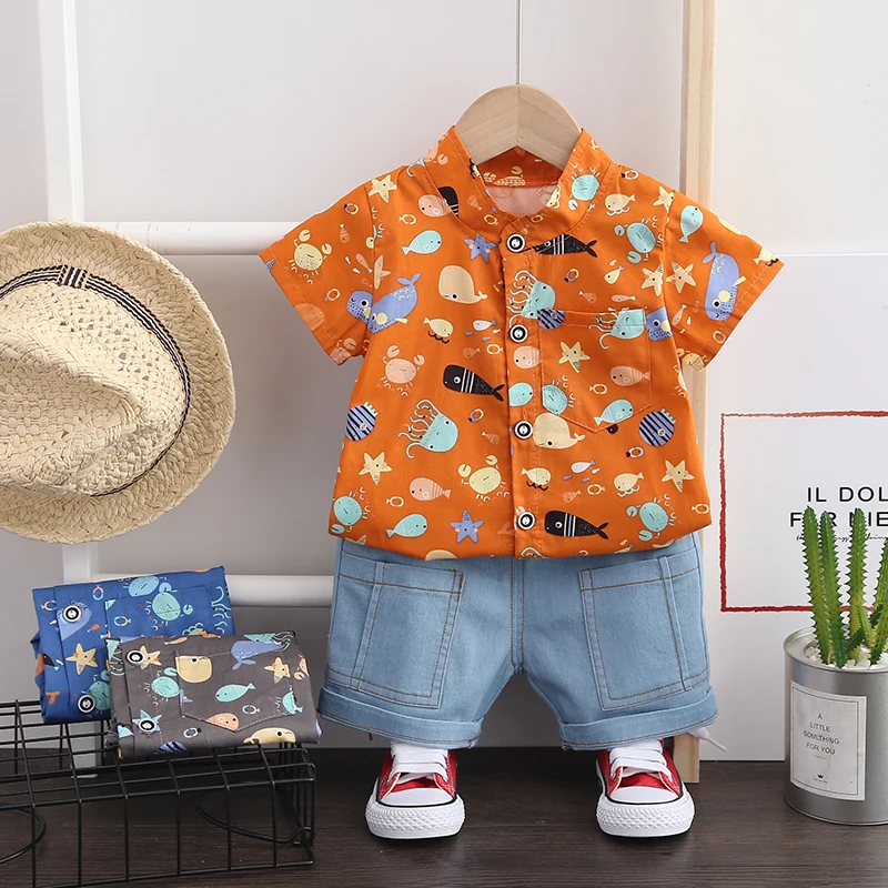 Boy children buttons printed shirt hot summer wear coat boy lovely design + blue pocket denim shorts suits the new 2021 children, Picture
Boy children buttons printed shirt hot summer wear coat boy lovely design + blue pocket denim shorts suits the new 2021 children, Picture