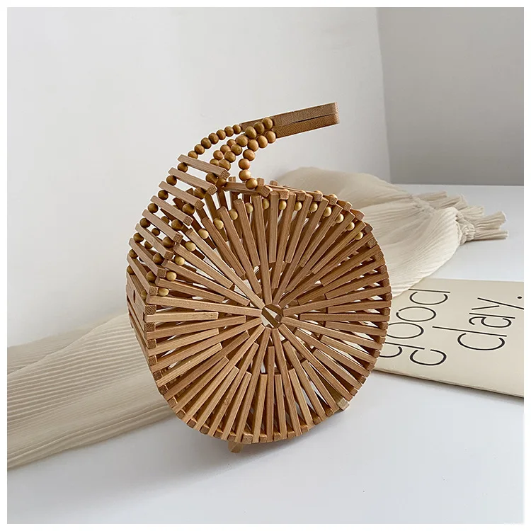 Bamboo straw purses 2021 wooden bead Summer Beach handbags for women round bamboo handmade ladies bag, As pics
Bamboo straw purses 2021 wooden bead Summer Beach handbags for women round bamboo handmade ladies bag, As pics
