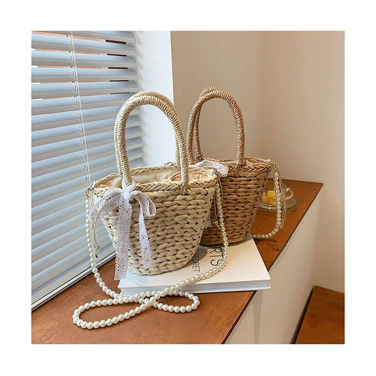 Summer 2021 Straw Bucket Bags Bead Pearl Crossbody Bags Lace Bow Handbags Female Outing Beach Hemp Woven Hand Bags for Women sac
Summer 2021 Straw Bucket Bags Bead Pearl Crossbody Bags Lace Bow Handbags Female Outing Beach Hemp Woven Hand Bags for Women sac
