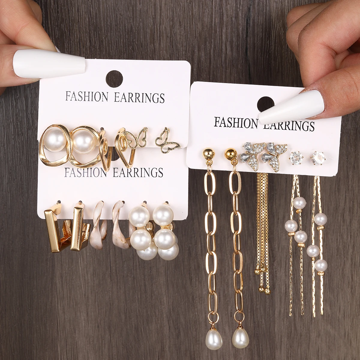Fashion Pearl long tassel irregular hollow-out butterfly earrings checkerboard chain stitching women's geometric earrings
Fashion Pearl long tassel irregular hollow-out butterfly earrings checkerboard chain stitching women's geometric earrings