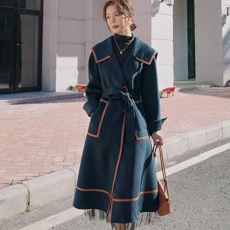 Dark green woolen coat women's mid-length 2021 autumn and winter new style Korean loose thick contrast color woolen coat women
Dark green woolen coat women's mid-length 2021 autumn and winter new style Korean loose thick contrast color woolen coat women