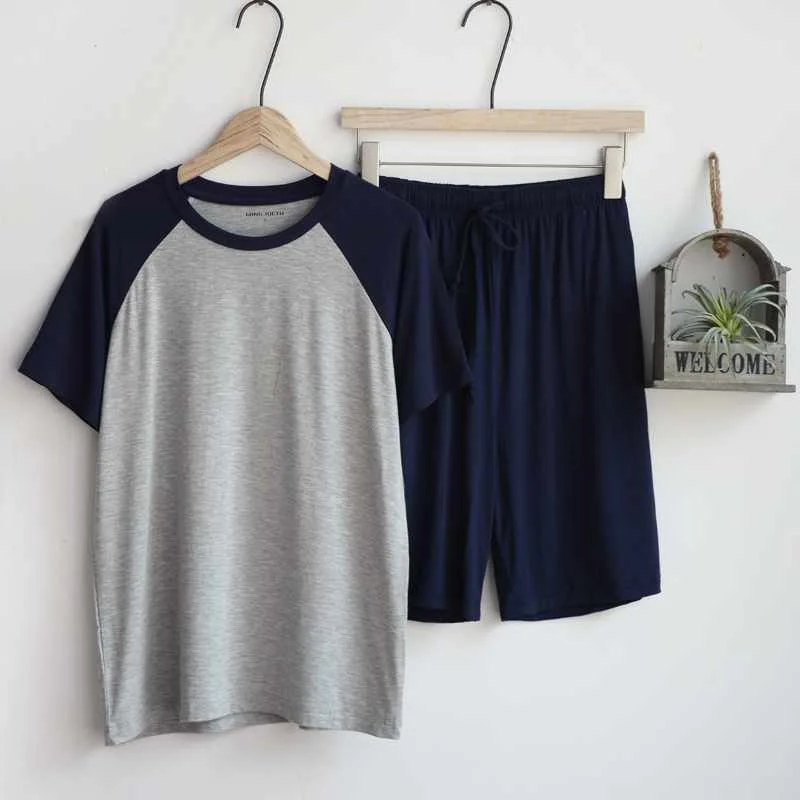 Modal summer pajamas for men thin section loose short sleeve shorts can be worn outside sports home service suit men sleepwear
Modal summer pajamas for men thin section loose short sleeve shorts can be worn outside sports home service suit men sleepwear