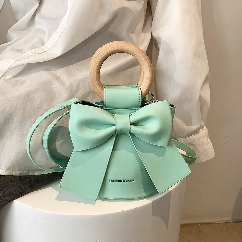 2022 Summer Fashion PU Leather Bag Drop shipping Shoulder Small Jelly Handbags Purse Women Mini Bow Tie Handbag
2022 Summer Fashion PU Leather Bag Drop shipping Shoulder Small Jelly Handbags Purse Women Mini Bow Tie Handbag