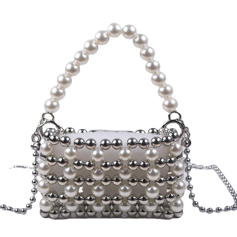 New pearl plating bead metal medium fashion ladies wallet boutique handmade beaded hollow portable messenger chain bag
New pearl plating bead metal medium fashion ladies wallet boutique handmade beaded hollow portable messenger chain bag
