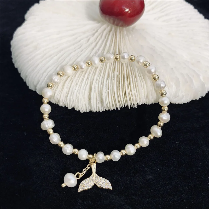 Wholesale baroque freshwater pearls zirconia gold mermaid tail bracelets jewelry
Wholesale baroque freshwater pearls zirconia gold mermaid tail bracelets jewelry