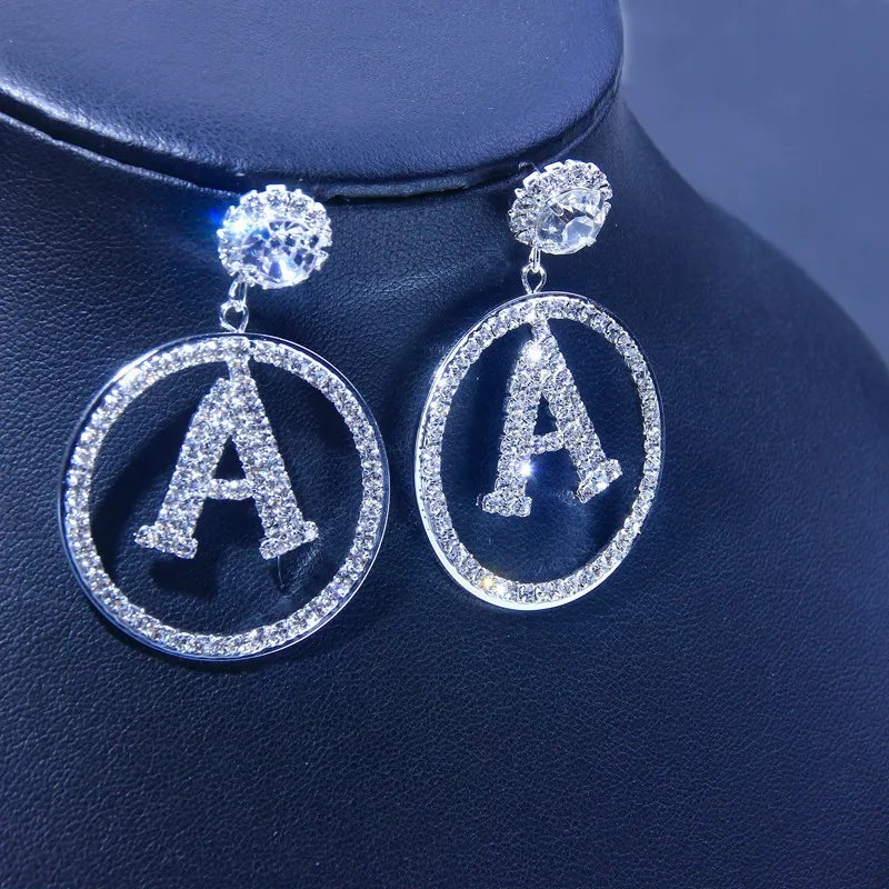 European and American fast selling fashion circle full diamond letter Rhinestone Earrings, Picture shows
European and American fast selling fashion circle full diamond letter Rhinestone Earrings, Picture shows