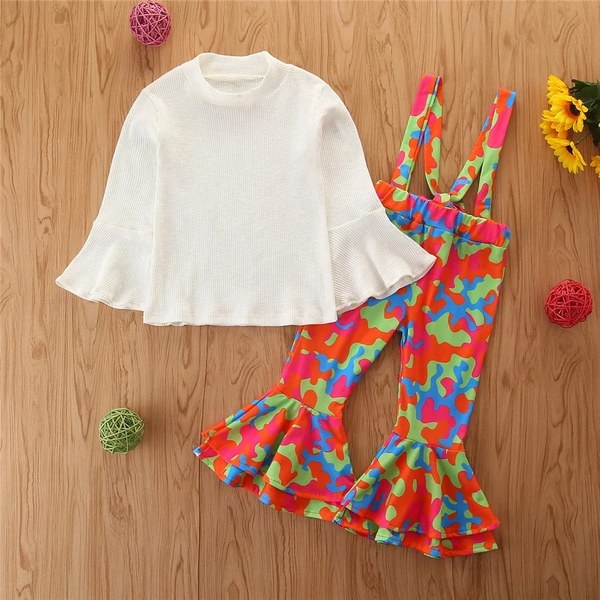 B53584A Autumn new kids girls fashion flare sleeve t-shirt with suspender pants, Shown
B53584A Autumn new kids girls fashion flare sleeve t-shirt with suspender pants, Shown