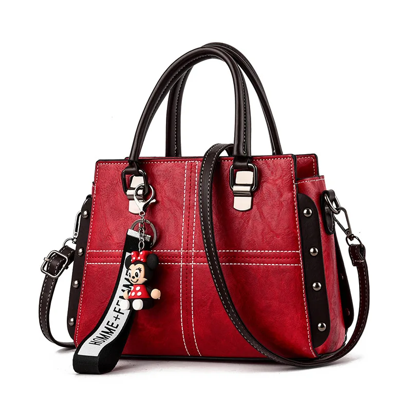 Wholesale New Designer vintage rivet decoration split leather luxury handbags for women with cartoon pendant, Black green pink wine red
Wholesale New Designer vintage rivet decoration split leather luxury handbags for women with cartoon pendant, Black green pink wine red