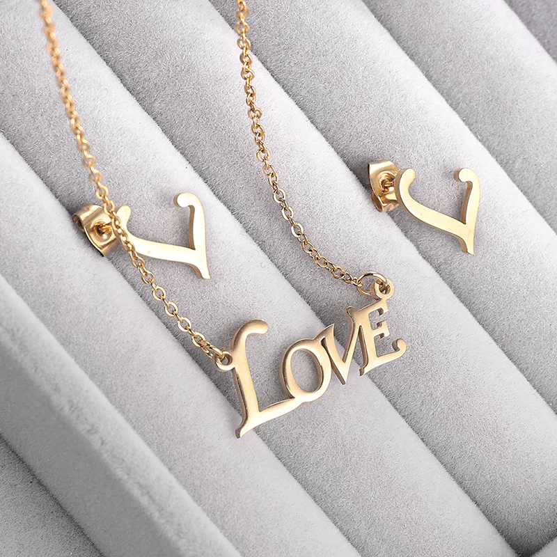 Wholesale gold letter heart stainless steel necklace and earrings set for women jewelry set gifts
Wholesale gold letter heart stainless steel necklace and earrings set for women jewelry set gifts