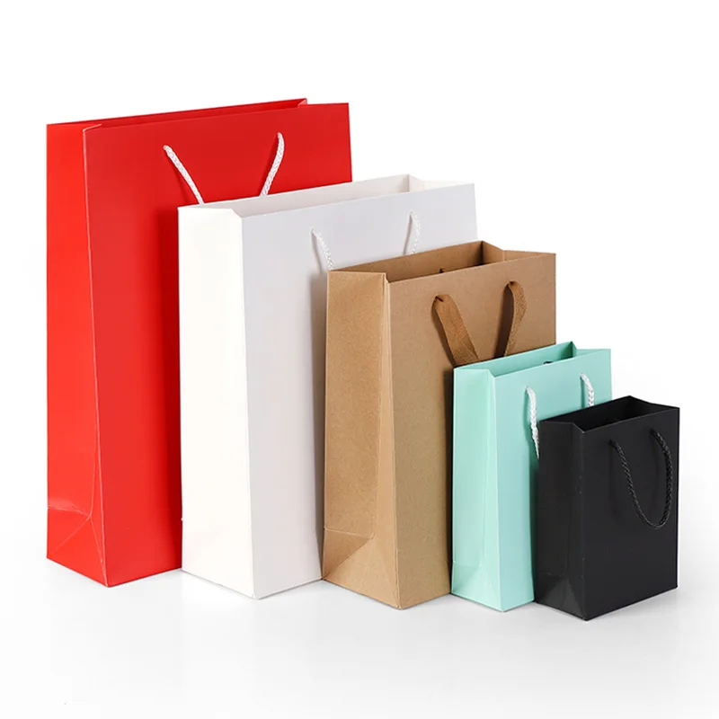Luxury gift bag with hot stamping and UV coating Matte finish kraft bag with embossed logo detail