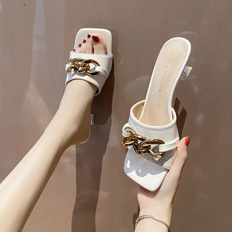 European station square toe slippers for female summer wear 2021 new one-line chain high heels 5cm back empty sandals
European station square toe slippers for female summer wear 2021 new one-line chain high heels 5cm back empty sandals