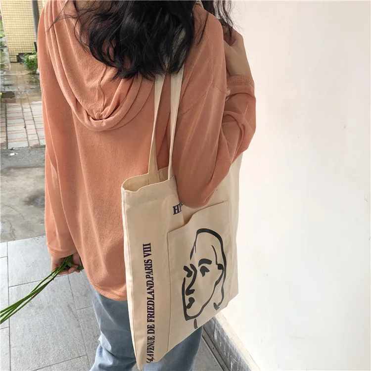 Pocket outside Tote Shoulder Bag Dual Purpose Custom Printing 12oz Cotton Canvas Tote Bag
Pocket outside Tote Shoulder Bag Dual Purpose Custom Printing 12oz Cotton Canvas Tote Bag
