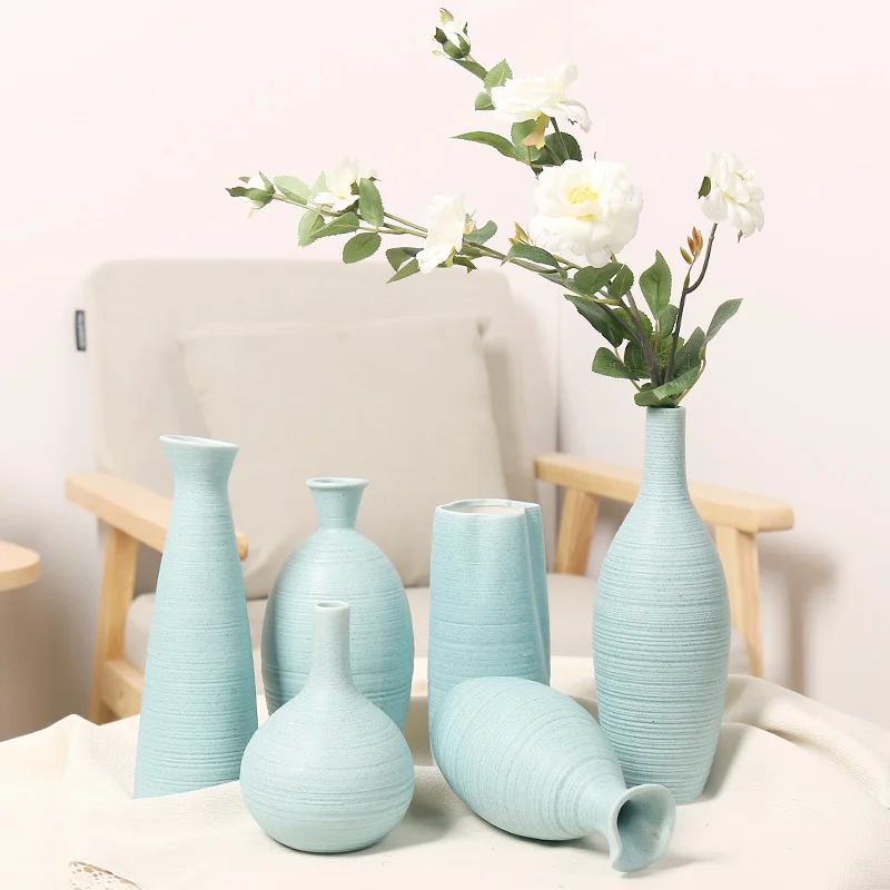 Modern simple blue tabletop ceramic vase features white ceramic & porcelain vases fragrance bottle, living room decoration, Blue,white
Modern simple blue tabletop ceramic vase features white ceramic & porcelain vases fragrance bottle, living room decoration, Blue,white