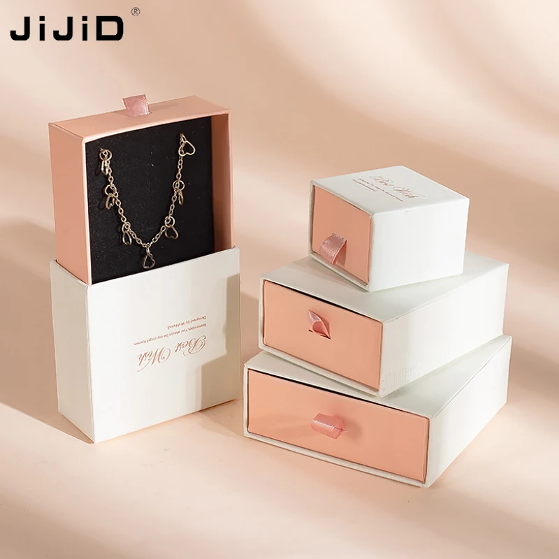 JiJiD Cardboard Jewelry Gift Bag Necklace Drawing Box Package Slide Drawer Paper Box With Black Foam For Jewelry Packaging
JiJiD Cardboard Jewelry Gift Bag Necklace Drawing Box Package Slide Drawer Paper Box With Black Foam For Jewelry Packaging