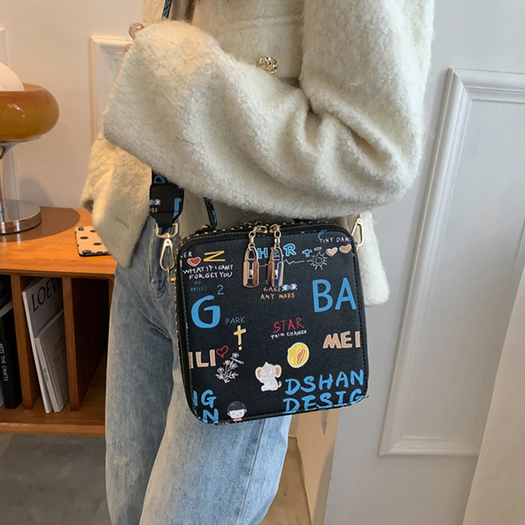 2022 Trendy Graffiti Print PU Fashion Bags Women Handbags Ladies Leather Shoulder Bag, Black,white
2022 Trendy Graffiti Print PU Fashion Bags Women Handbags Ladies Leather Shoulder Bag, Black,white