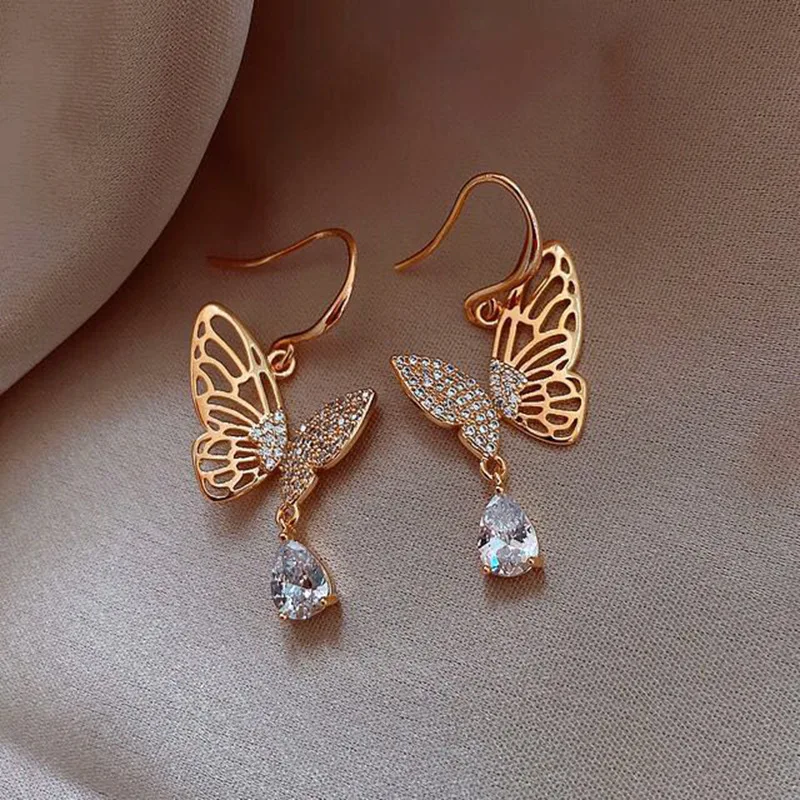 Fashion European Style Jewelry 14K Gold Plated Hollow Butterfly Hook Earrings Shiny CZ Butterfly Drop Earrings
Fashion European Style Jewelry 14K Gold Plated Hollow Butterfly Hook Earrings Shiny CZ Butterfly Drop Earrings