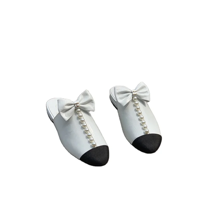 Spring/summer 2021 new small fragrance wind pearl semi-drag color wrap head flat bow fashion women's sandals
Spring/summer 2021 new small fragrance wind pearl semi-drag color wrap head flat bow fashion women's sandals