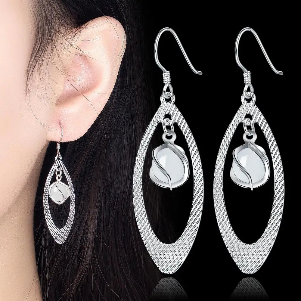 Fashionable opal earrings for women with long tassels. Korean elegant versatile earrings
Fashionable opal earrings for women with long tassels. Korean elegant versatile earrings