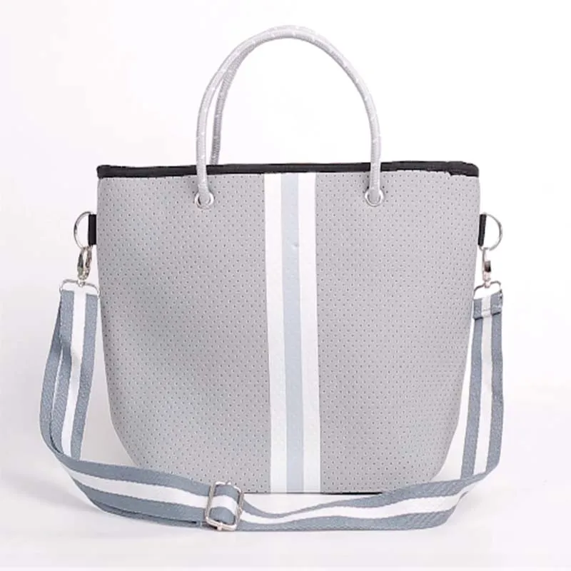 2020 Hot selling perforated neoprene cross body stripe bag, Black, blue, beige, red, yellow,etc.
2020 Hot selling perforated neoprene cross body stripe bag, Black, blue, beige, red, yellow,etc.