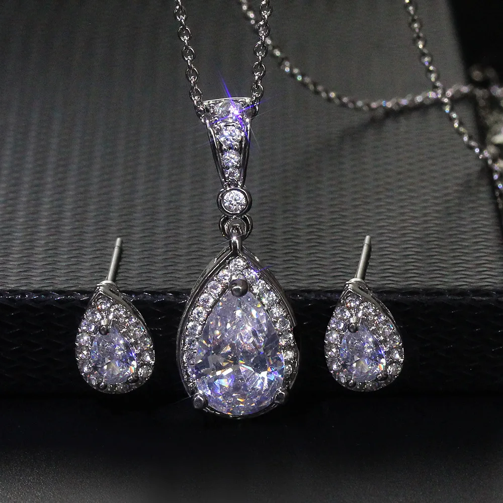 New Royal Diamond Cz Waterdrop Pendant Necklace Stud Earrings Wedding Crystal Cubic Zircon Water Drop Jewelry Set for Women
New Royal Diamond Cz Waterdrop Pendant Necklace Stud Earrings Wedding Crystal Cubic Zircon Water Drop Jewelry Set for Women