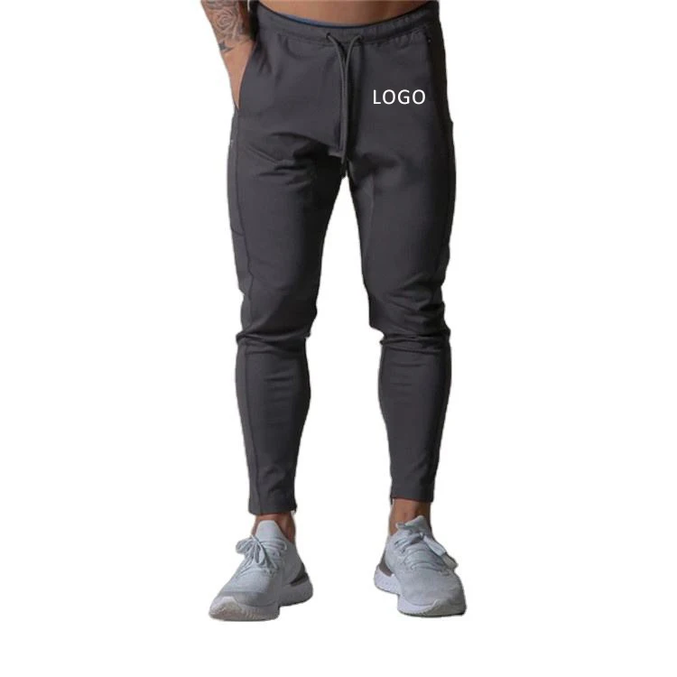 New design wholesale blank active gym pants OEM custom logo mens joggers skinny track pants with zipper pockets
New design wholesale blank active gym pants OEM custom logo mens joggers skinny track pants with zipper pockets