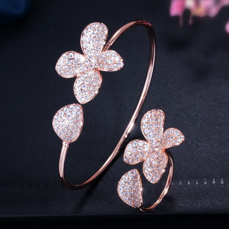 European and American Creative adjustable flower bracelet ring two piece set of copper micro inlaid zircon fashion versatile jew, Gold color
European and American Creative adjustable flower bracelet ring two piece set of copper micro inlaid zircon fashion versatile jew, Gold color