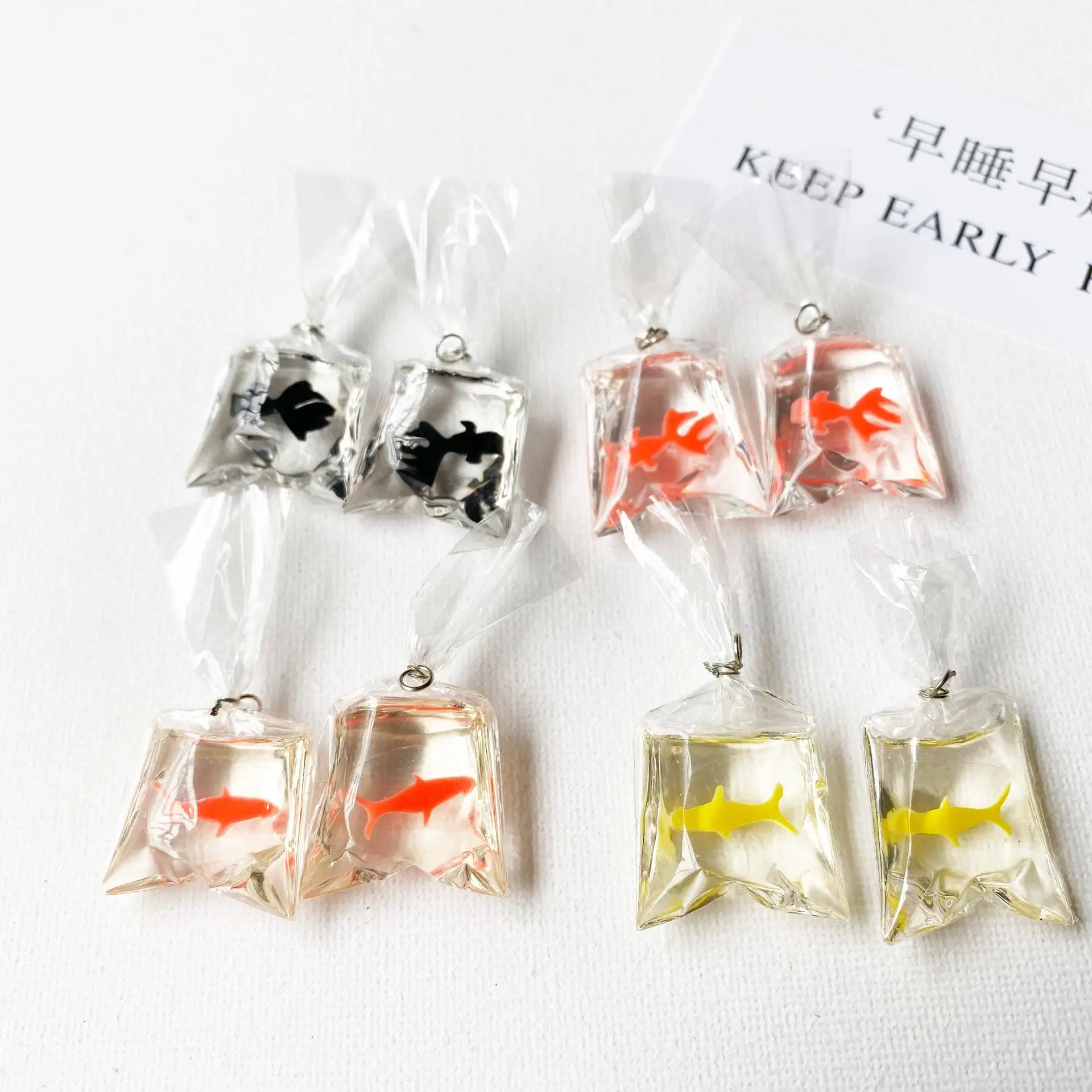 Transparent Resin Goldfish Charms Small Fish In Water Bag Jewelry Pendant Fish Bag Earrings Pendant Handmade DIY
Transparent Resin Goldfish Charms Small Fish In Water Bag Jewelry Pendant Fish Bag Earrings Pendant Handmade DIY