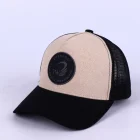 Baseball cap/hat with embossed fabric with rubber patch