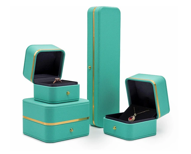 Hot gift luxury jewelry packaging pu leather ring necklace jewelry green jewelry boxes with golden band
Hot gift luxury jewelry packaging pu leather ring necklace jewelry green jewelry boxes with golden band