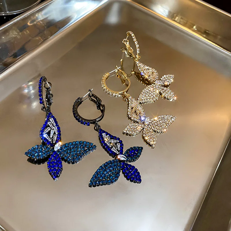 Luxury Fashion Hollow Crystal Butterfly Drop Earrings White Blue Zircon Butterfly Clip On Earrings For Party 
Luxury Fashion Hollow Crystal Butterfly Drop Earrings White Blue Zircon Butterfly Clip On Earrings For Party