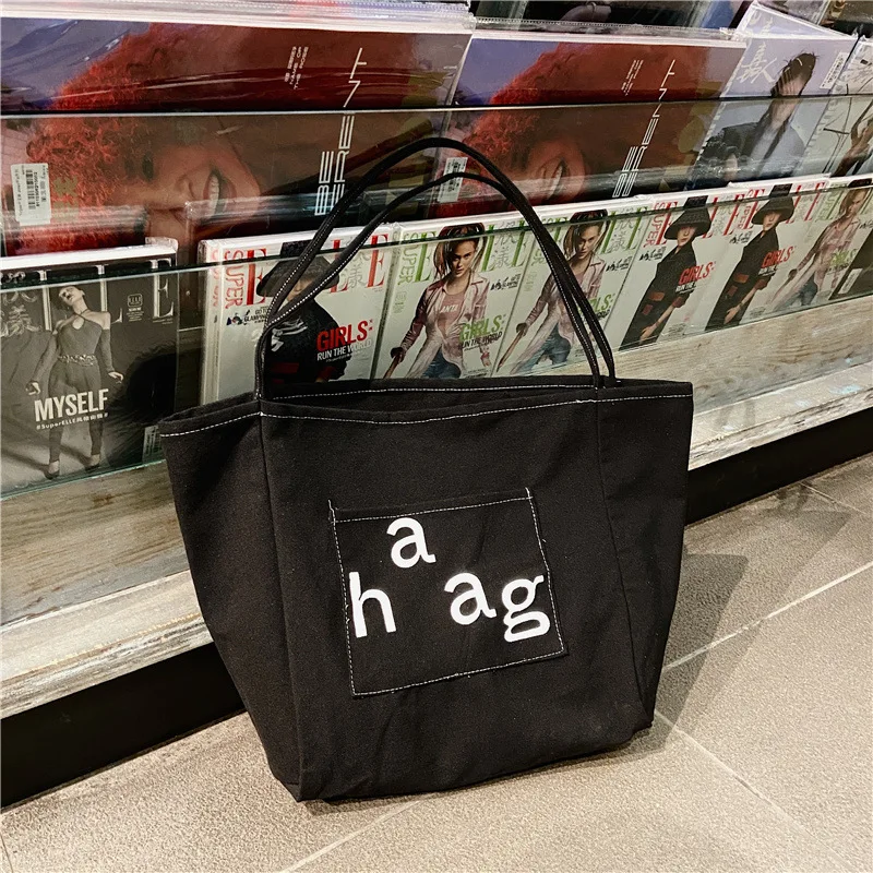 Korean style Single Shoulder Handbag Simple Wind Letter Print Canvas Bag Ladies Large Capacity Tote Bag available Wholesale Shop, Black
Korean style Single Shoulder Handbag Simple Wind Letter Print Canvas Bag Ladies Large Capacity Tote Bag available Wholesale Shop, Black