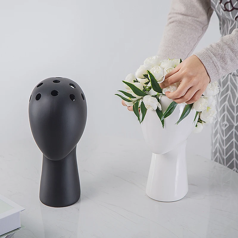 Nordic Style Creative Human head vase Model Ceramic Vase Round Hole Flower Home Decoration Flower Vase face planter
Nordic Style Creative Human head vase Model Ceramic Vase Round Hole Flower Home Decoration Flower Vase face planter